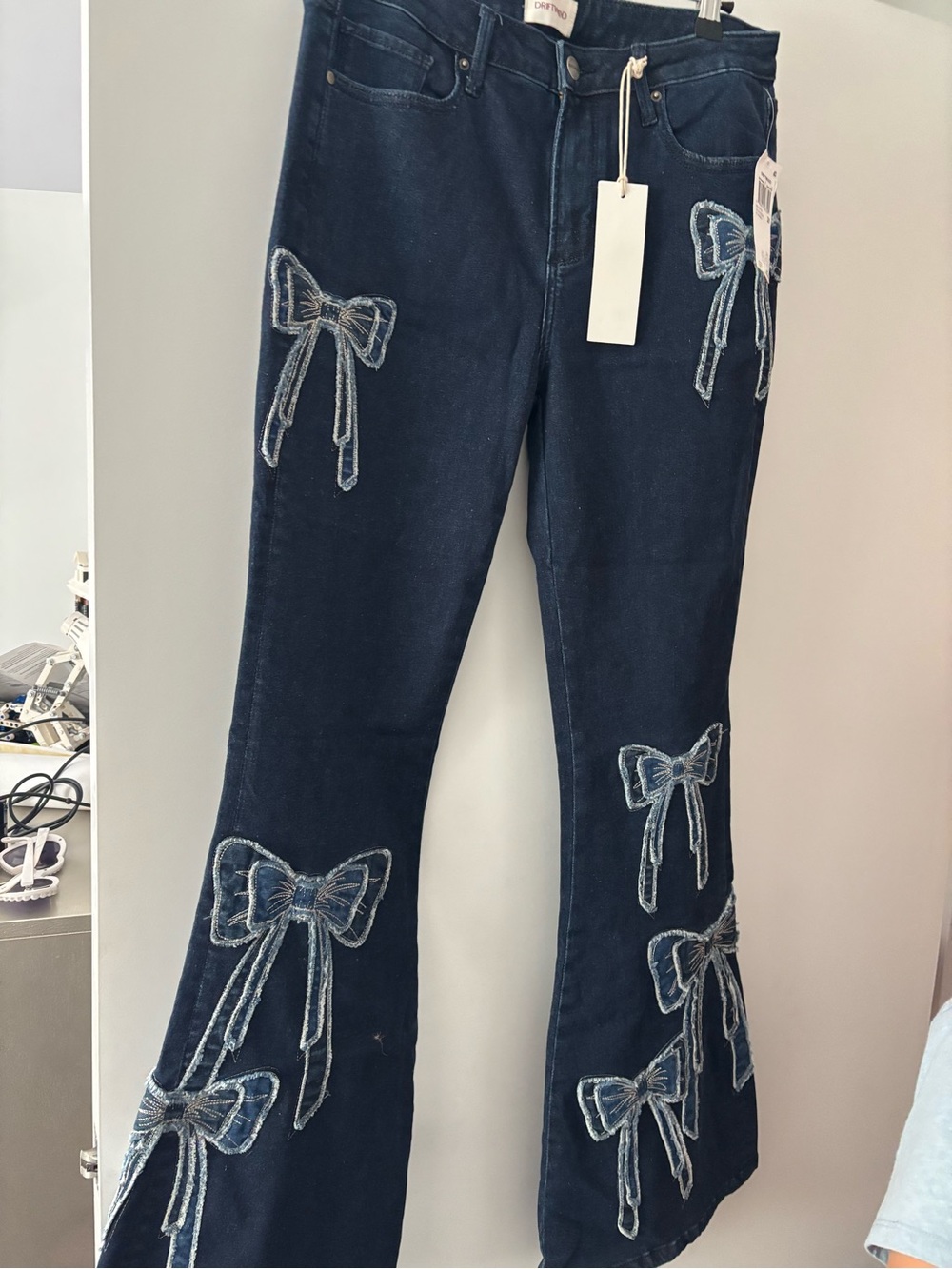 DRIFTWOOD Dark Navy Flare Jeans with Embroidered Bow Accents